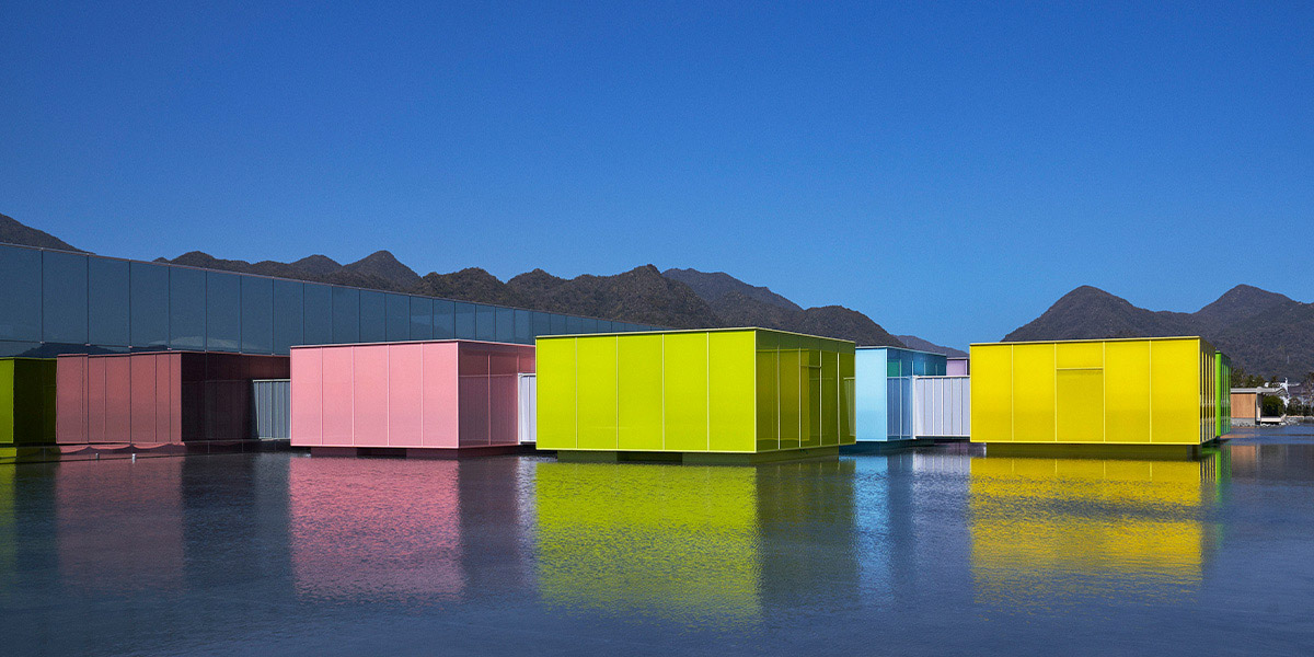 SIMOSE Art Museum’s colourful galleries reflected in water